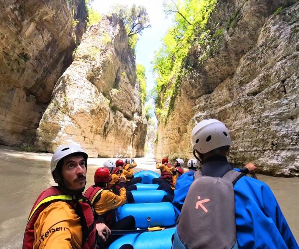 Rafting group entering the narrow walls of Osumi Canyon